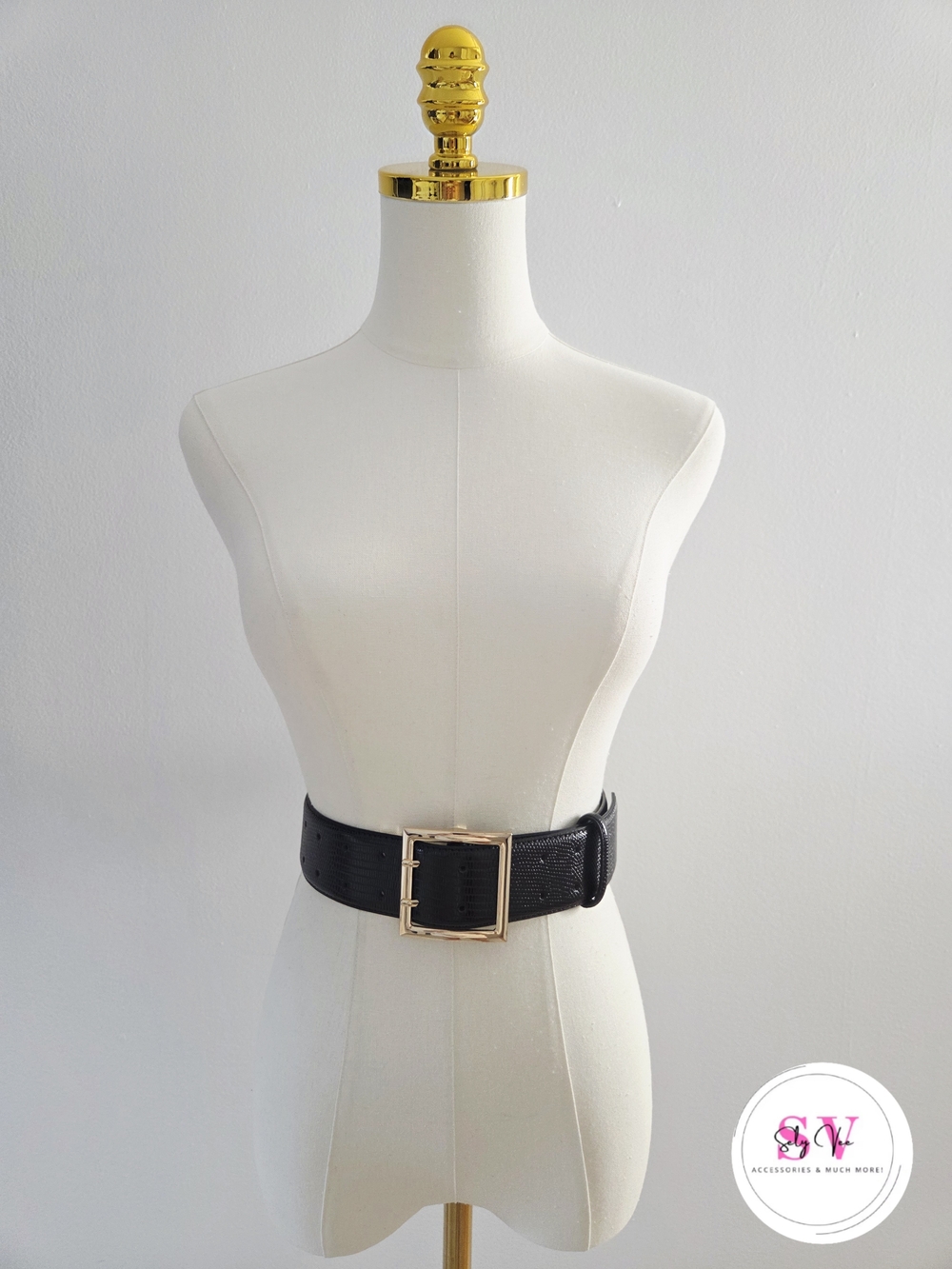 Black belt with gold buckle